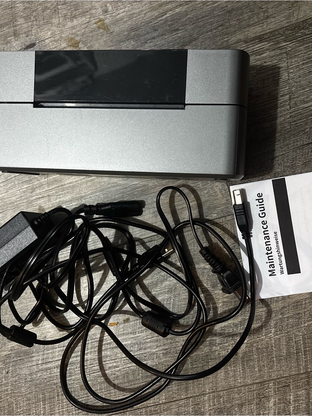 Portable Silver label printer with Black Cables